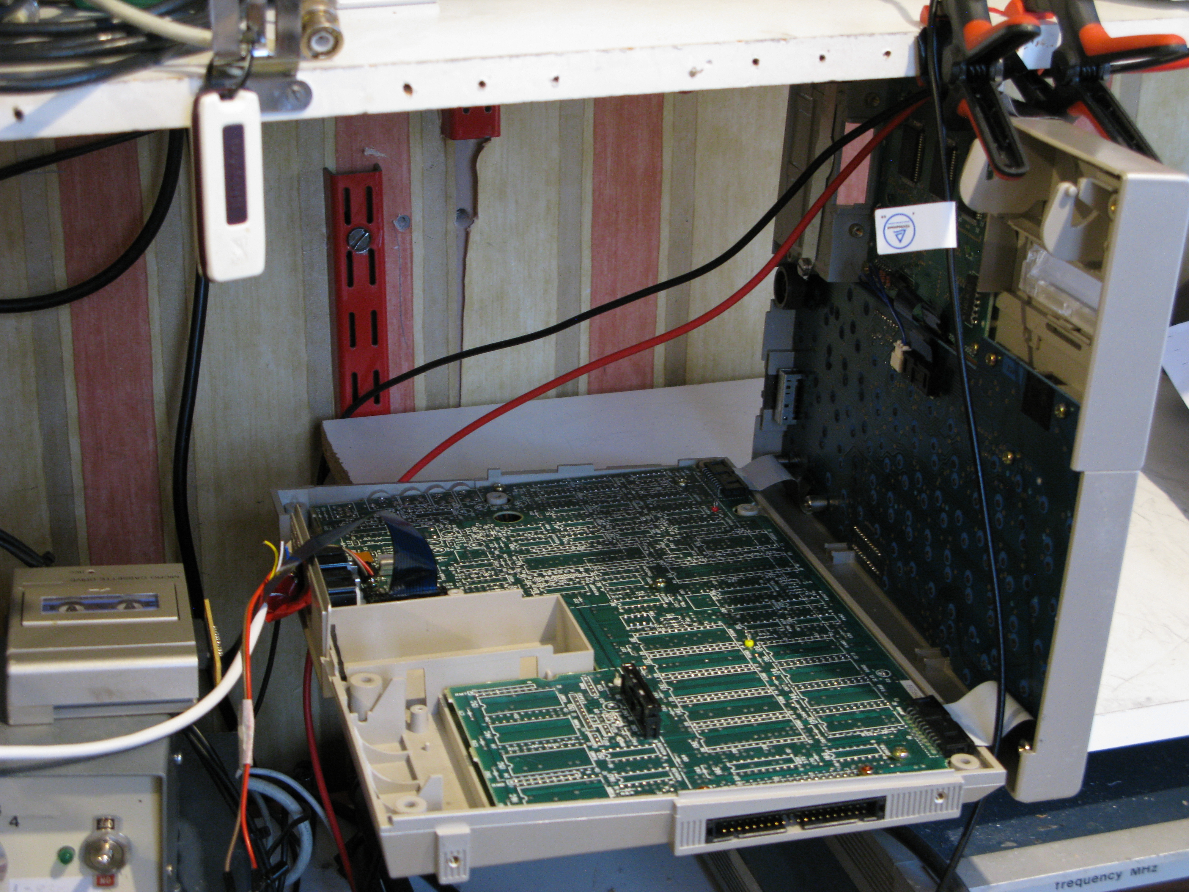 Epson open, with the two sections at 90 degrees, propped open on a shelf.