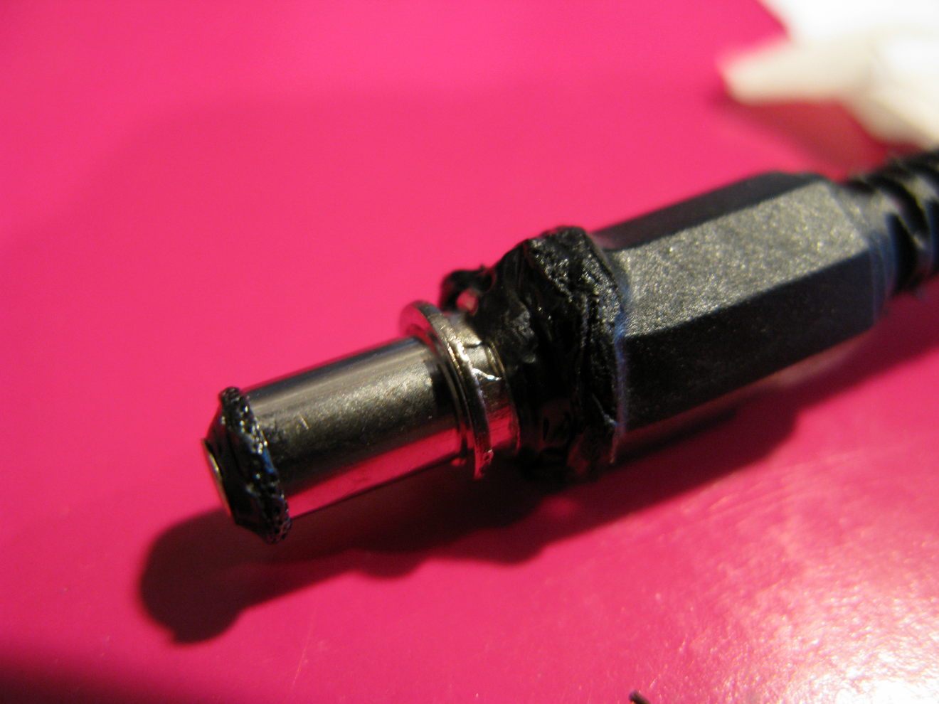 A somewhat melted power jack